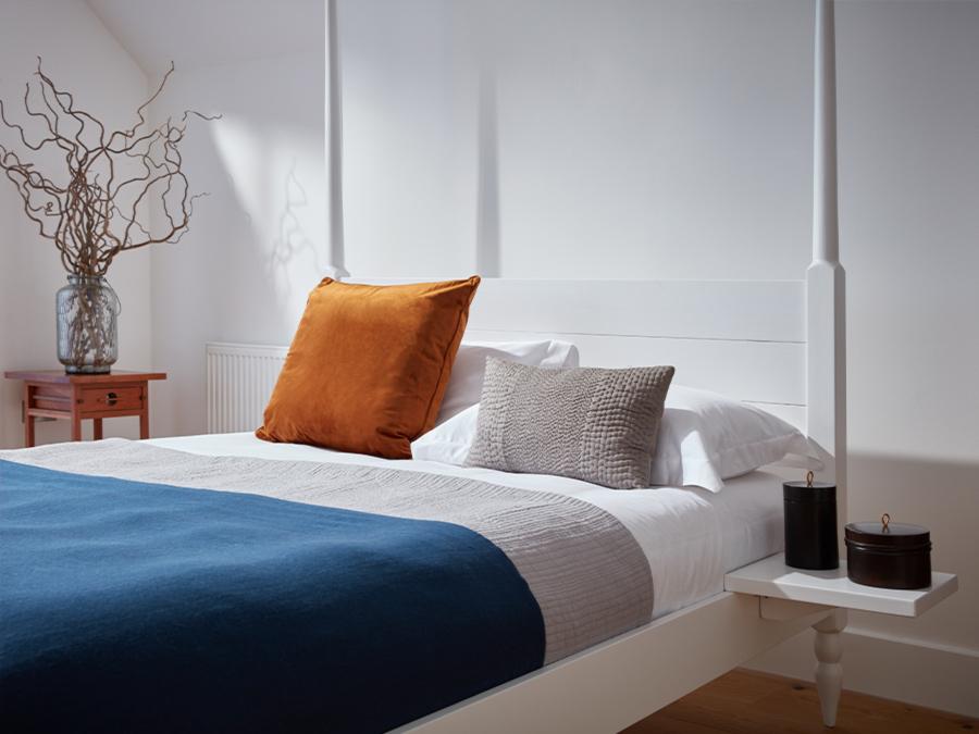 wooden morrocan four poster bed side view
