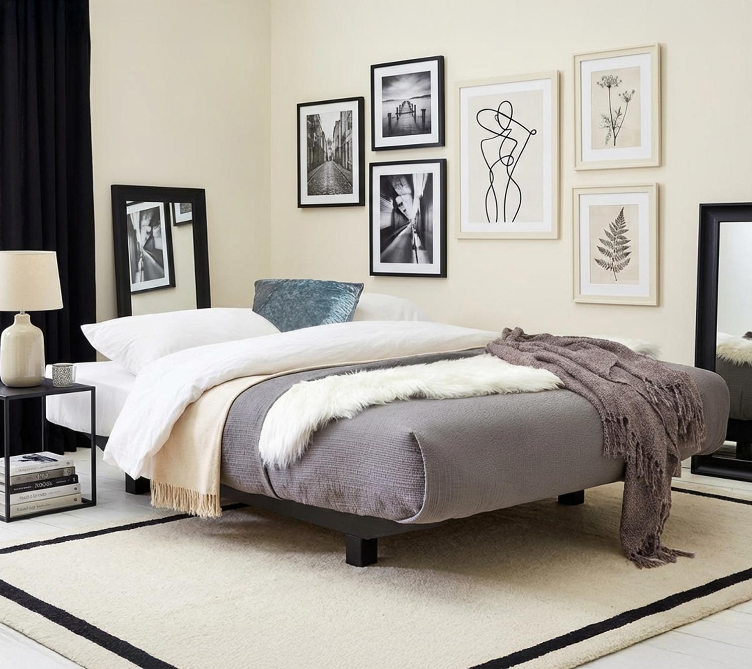 Artwork ideas for black and cream bedroom design